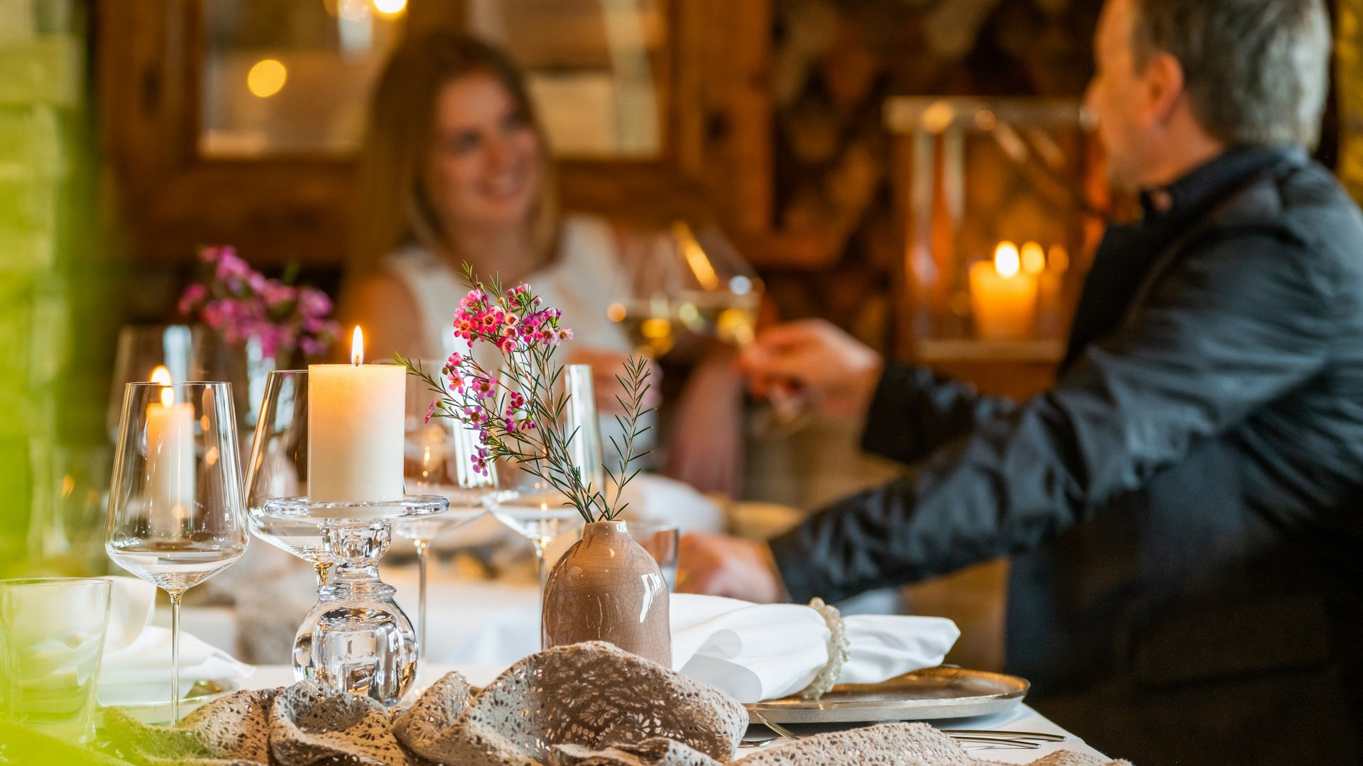 Hotel Sonnenhof Romantic dinner with candlelight and flowers on the table